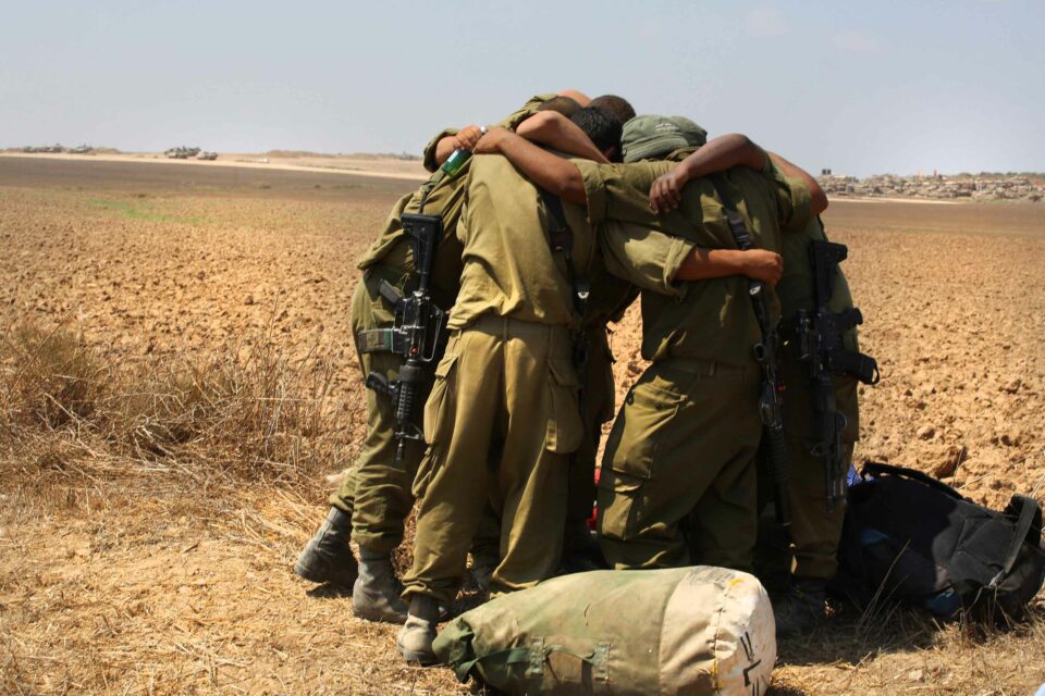חיילים יוצאים מעזה במהלך צוק איתן, צילום: מרים צחי
